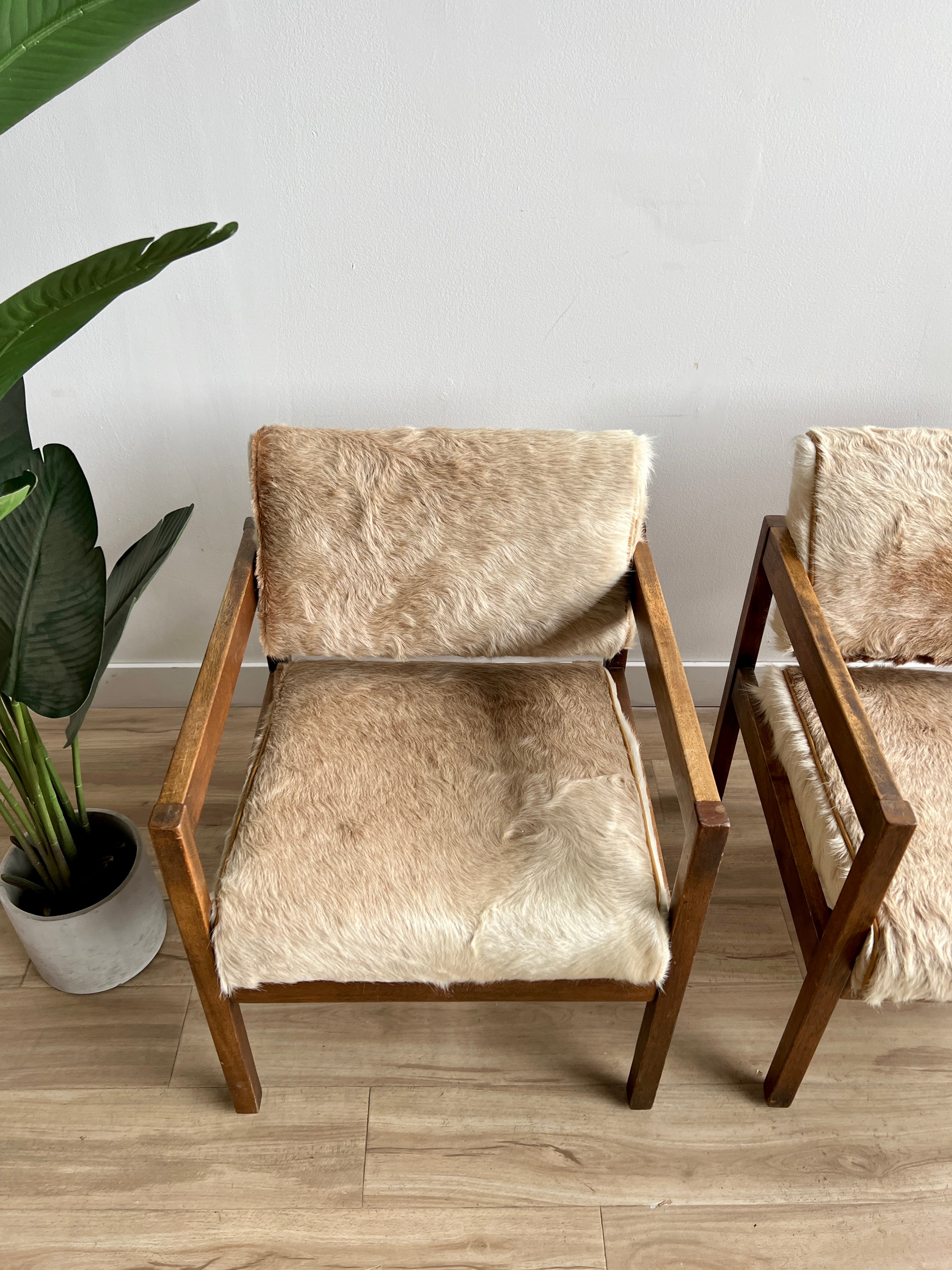 Pair of Vintage Mid Century Lounge Chairs Upholstered in Natural Cowhide