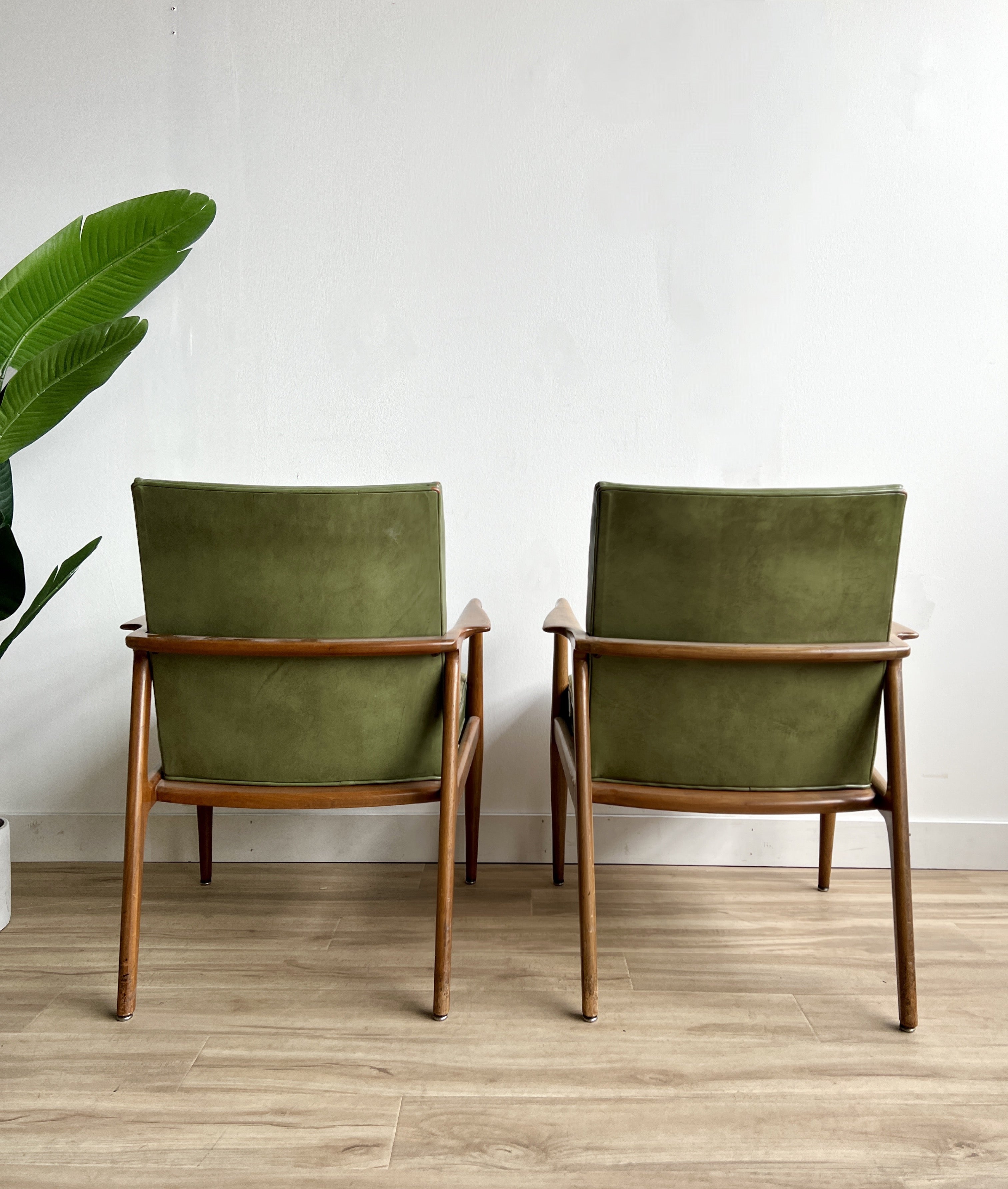 Mid Century Arm Chairs in leather by Stow & Davis