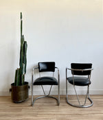 Pair of vintage Arm Chairs Upholstered in Your Choice of Leather